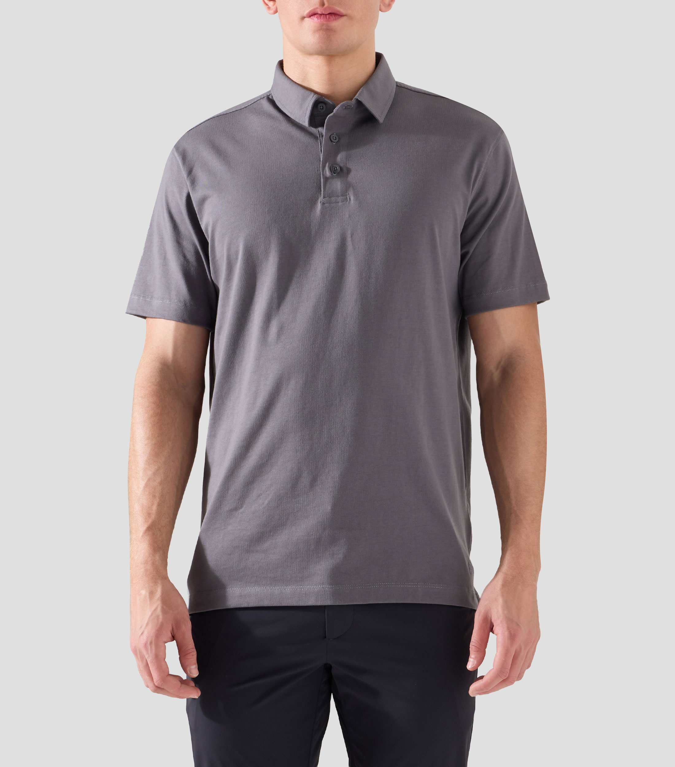 Playera tipo polo con manga corta lisa Hombre
